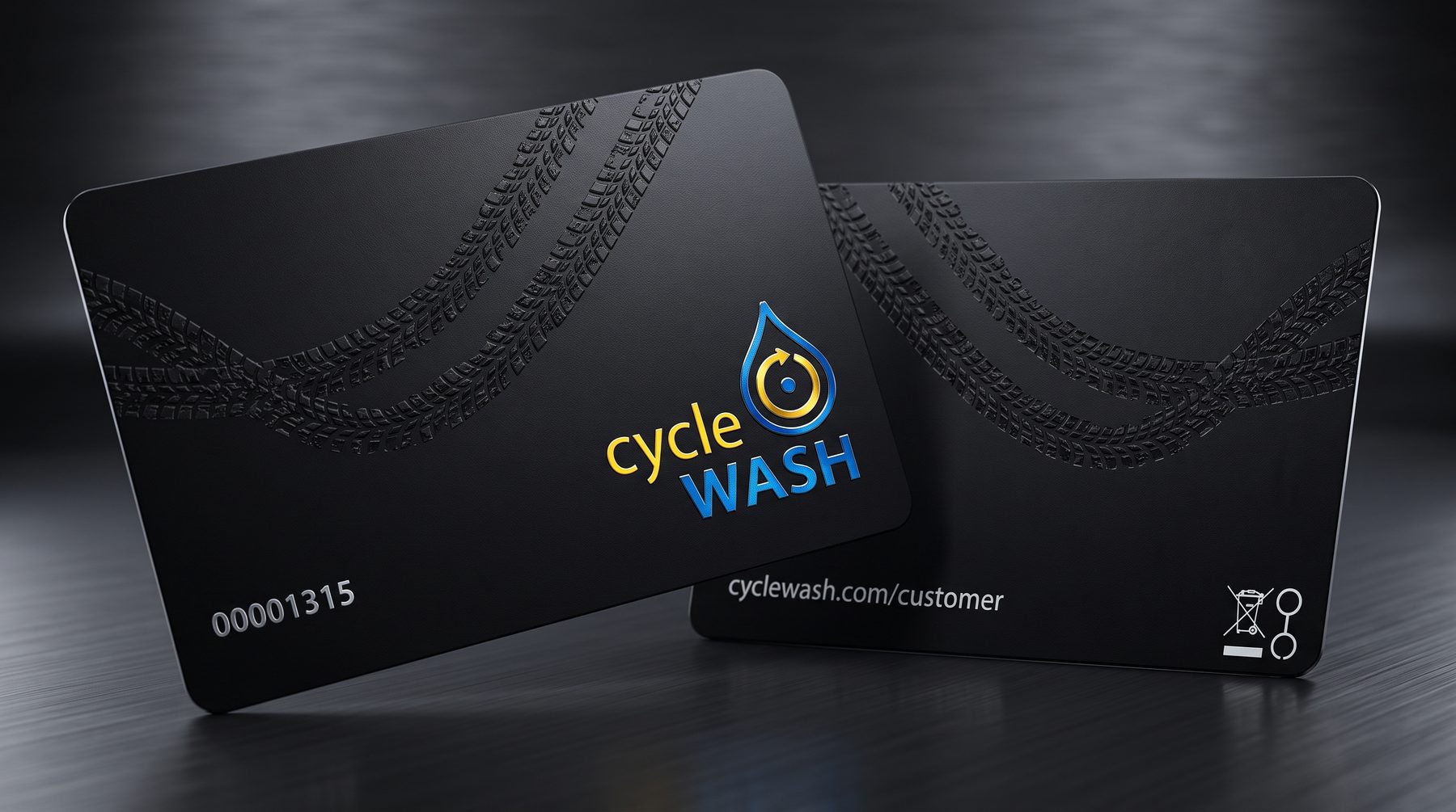 Two black cycleWASH cards with an embossed tyre track, card number 00001315 on the front and cyclewash.com/customer on the back