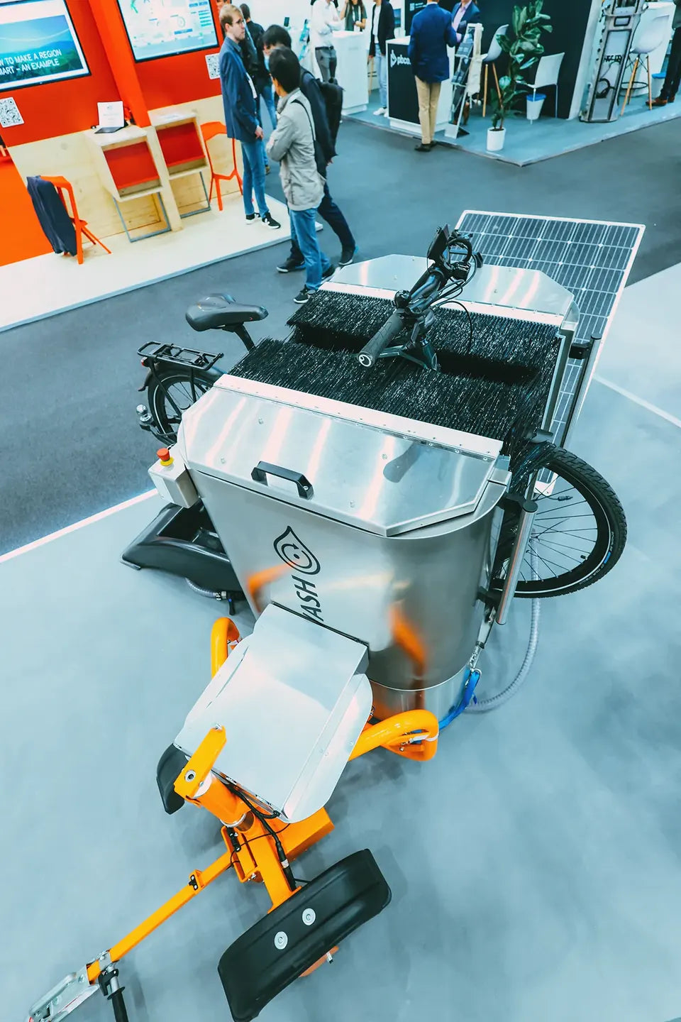 The cycleWASH Mini Platinum on its trailer with the solar panel raised, at the Smart City Expo World Congress